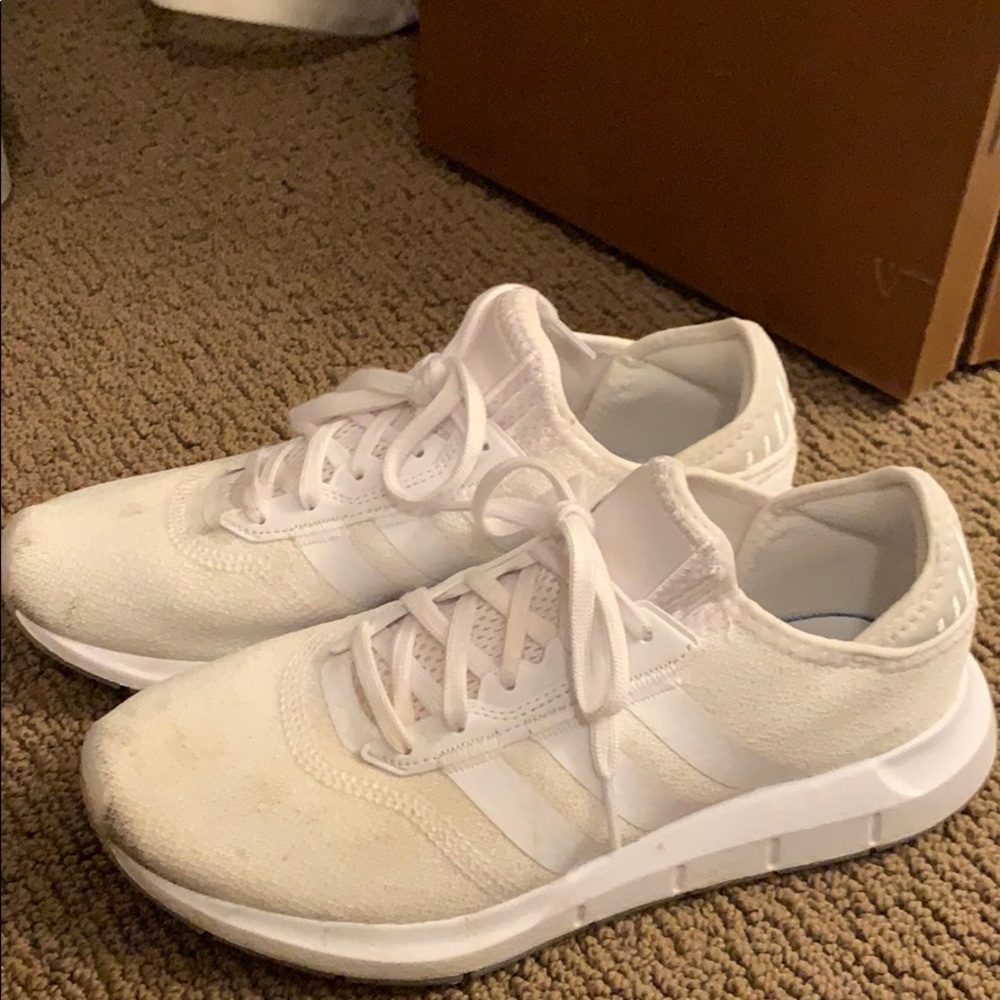 Women’s white adidas sneakers